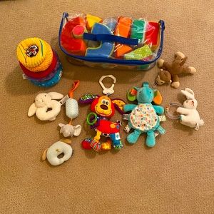 Collection of plush infant toys (9)